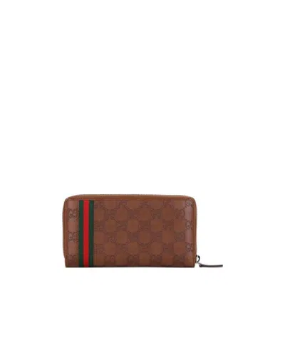 Gucci Long Zipper Purse In Brown