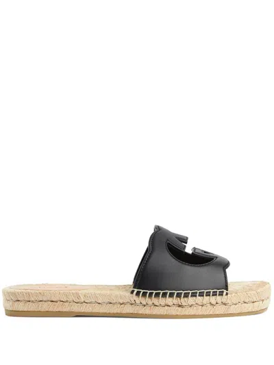 GUCCI GUCCI MAKE A STATEMENT WITH THESE ICONIC GUCCI INTERLOCKING G SLIDES.