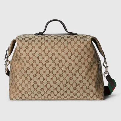 GUCCI GUCCI GG CANVAS MEDIUM DUFFLE BAG