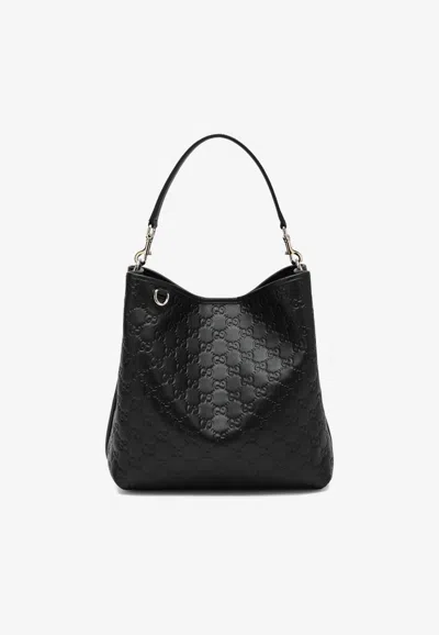 Gucci Medium Gg Embossed Bucket Bag In Black