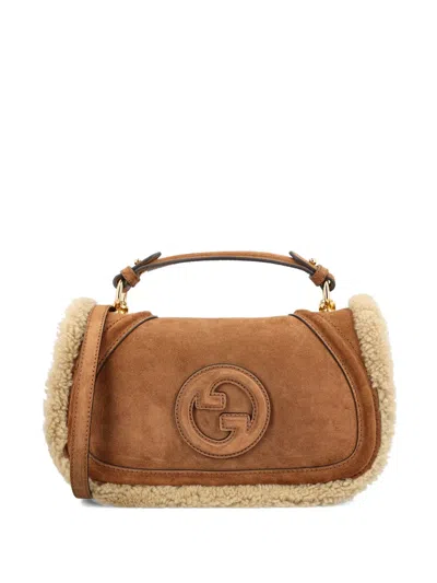 Gucci Medium Shearling Logo-plaque Tote Bag In Brown