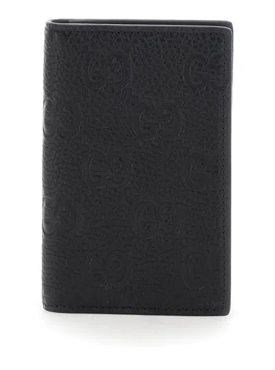GUCCI GUCCI MEN BLACK BI-FOLD WALLET WITH VERTICAL DESIGN IN GG GRANIED LEATHER MAN