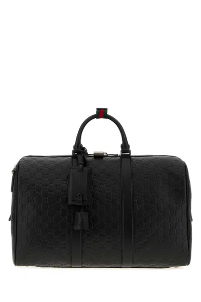 Gucci Mediumgg Emblem Leather Duffle Bag In Black