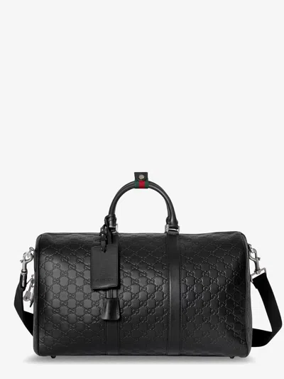 Gucci Men Coated Canvas Gg Emblem Travel Bag With Gg Motif In Black