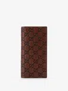 Gucci Men Gg Emblem Leather Wallet With Embossed Gg Motif In Brown