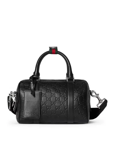 Gucci Men Gg Emblem Small Duffle Bag In Black