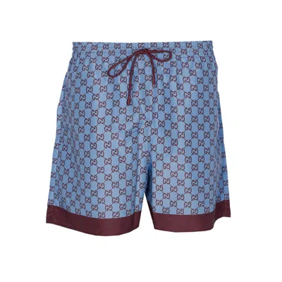 Gucci Men Gg Logo Printed Swimwear In Technical Popeline In Blue