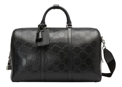 Pre-owned Gucci Men's  Gg Embossed Duffle Bag In Black