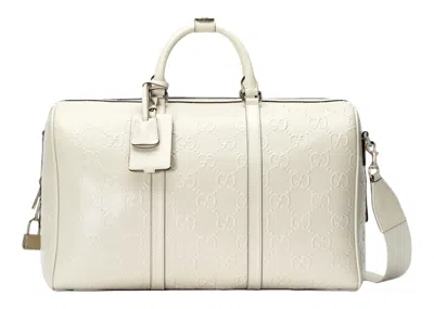 Pre-owned Gucci Men's  Gg Embossed Duffle Bag In White