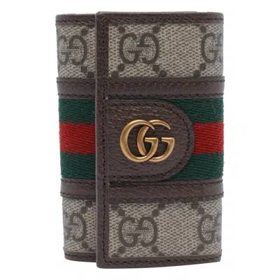 Gucci Gg Supreme Fabric And Leather Key Ring In Brown