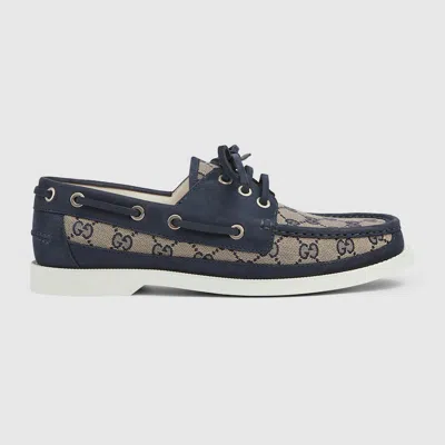 Gucci Gg Leather-trimmed Canvas Boat Shoes In Blue