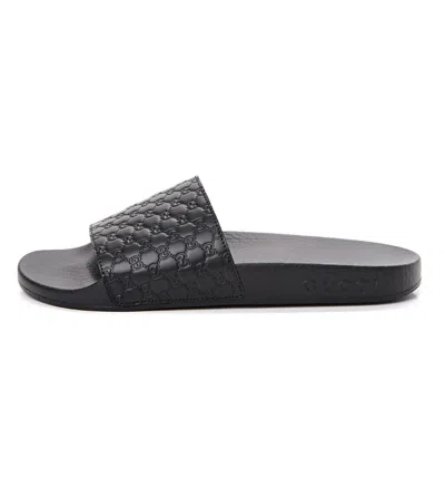 Pre-owned Gucci Microssima Logo-embossed Leather Rubber Sliders Sandals In Black