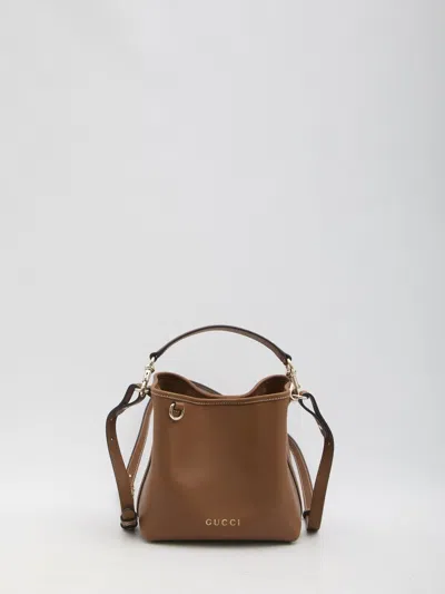 GUCCI GUCCI  MINI GG EMBLEM BUCKET BAG BROWN