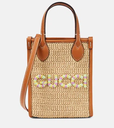 Gucci Mini Logo Raffia Tote Bag In Beige