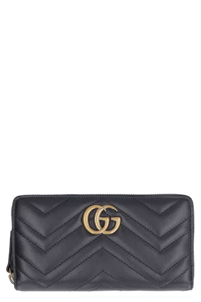 Gucci Mini Quilted Leather Zip Around Wallet In Black