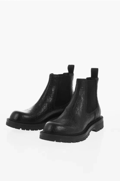 Gucci Monogram Embossed Leather Chelsea Booties In Black