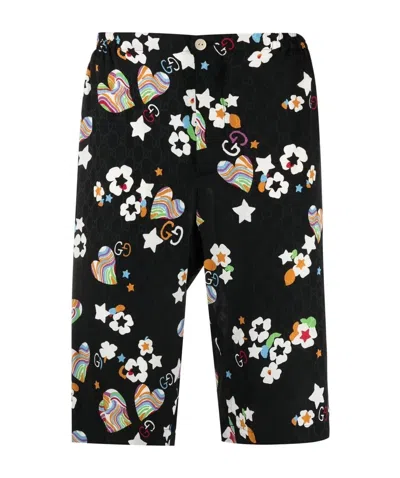 GUCCI MONOGRAM-PRINT KNEE-LENGTH SHORTS