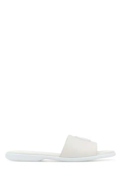 Gucci Calfskin Leather Slides With Embossed Gg Monogram In White