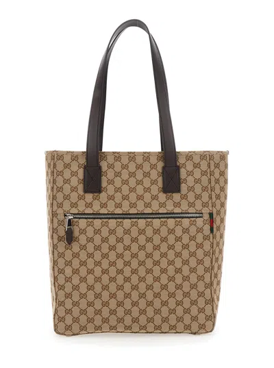 GUCCI GUCCI MEN BEIGE TOTE BAG WITH TWO TOP LEATHER HANDLES AND FRONT ZIP POCKET IN GG CANVAS MAN