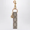 Gucci Ophidia Keychain In Gg Supreme Fabric In Gold
