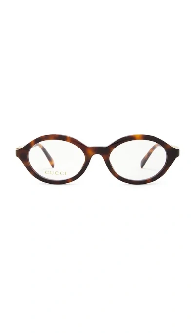 Gucci Oval Eyeglasses In Brown
