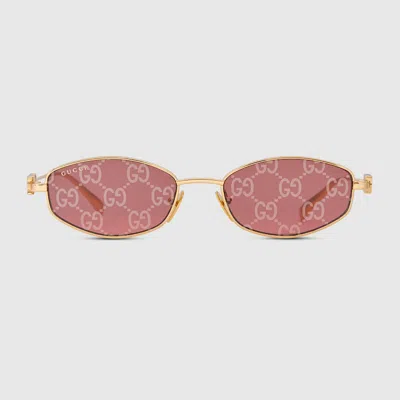 Gucci Oval Frame Sunglasses In Gold
