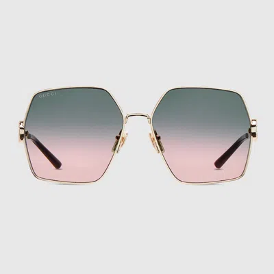 Gucci Oval Frame Sunglasses In Metallic