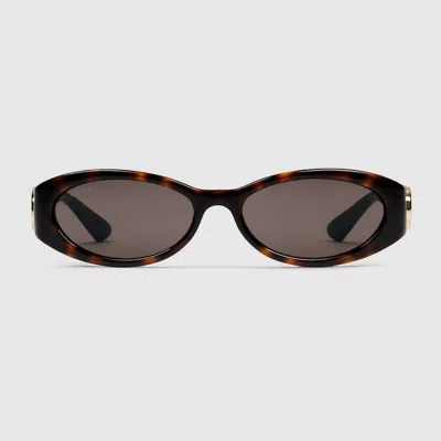 Gucci Oval Frame Sunglasses In Brown