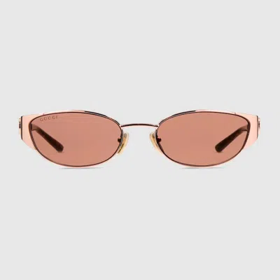 Gucci Oval-frame Sunglasses In Gold