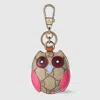 Gucci Owl-shaped Bag Charm In Beige