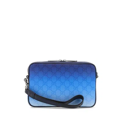 Gucci Printed Canvas Clutch In Blue