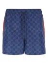 Gucci Men Nylon Swim Shorts With All-over Gg Motif In Blue