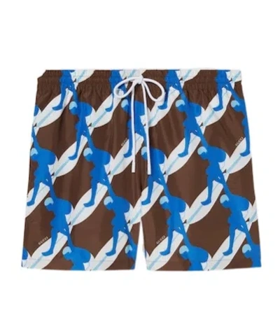 GUCCI GUCCI GRAPHIC PRINTED SWIM SHORTS