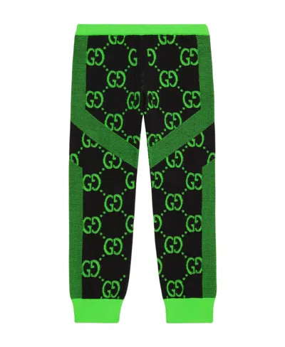 Gucci Printed Trousers In Black
