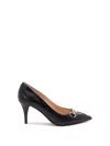 Gucci Calf Leather Bos Taurus Mid Heel Pumps In Animal Print