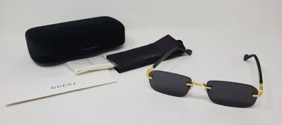 Pre-owned Gucci Rectangular Rimless Sunglasses Gg1221s 001, Black/gold-gray Lens 140mm