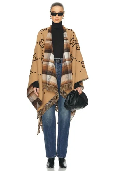 Gucci Reversible Poncho Cape In Brown