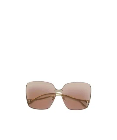 Gucci Rimless Pilot Sunglasses In Nude