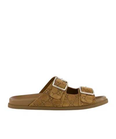 Gucci Round-toed Slippers In Brown