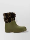 GUCCI RUBBER AND TEDDY ANKLE BOOTS WITH ANIMAL PRINT CUFF