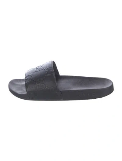 Pre-owned Gucci Rubber Slides In Black