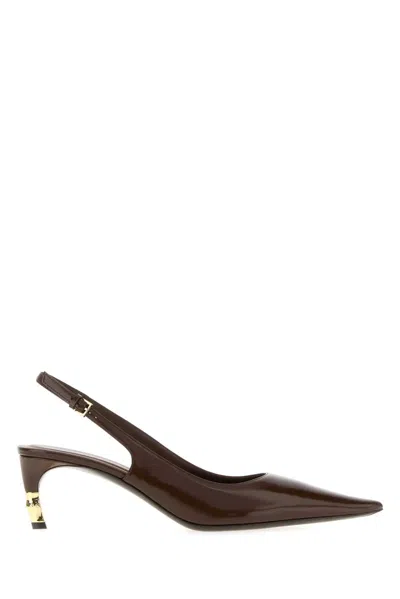 Gucci Leather Mules In Brown