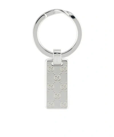 Gucci Signature Gg Engraved Keyring In Metallic