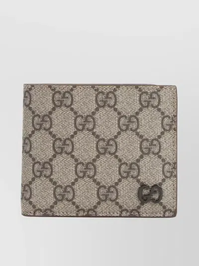 Gucci Signature Gg Supreme Bi-fold Wallet In Brown