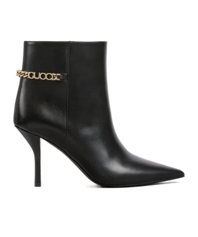 GUCCI GUCCI LOGO PLAQUE POINTED-TOE BOOTS