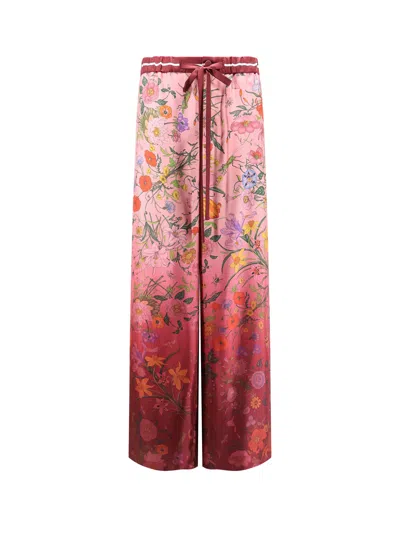 GUCCI SILK TROUSERS WITH GUCCI FLORA PRINT