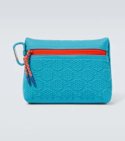 Gucci Small Embossed Gg Pouch In Blue