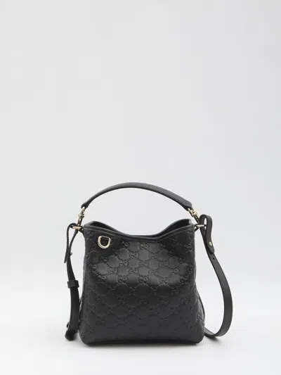 Gucci Small Gg Emblem Bucket Bag In Black