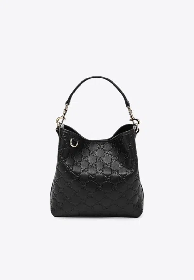 Gucci Small Gg Embossed Bucket Bag In Black
