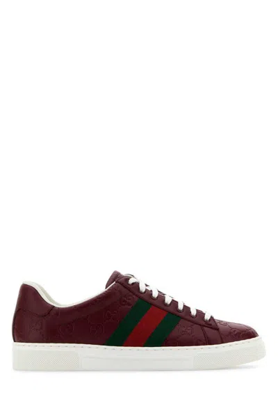 Gucci Men's Ace Gg Embossed Leather Low-top Sneakers In Red
